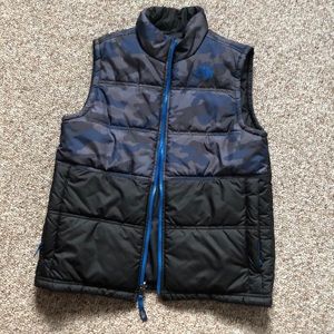 Like new North Face vest reversible